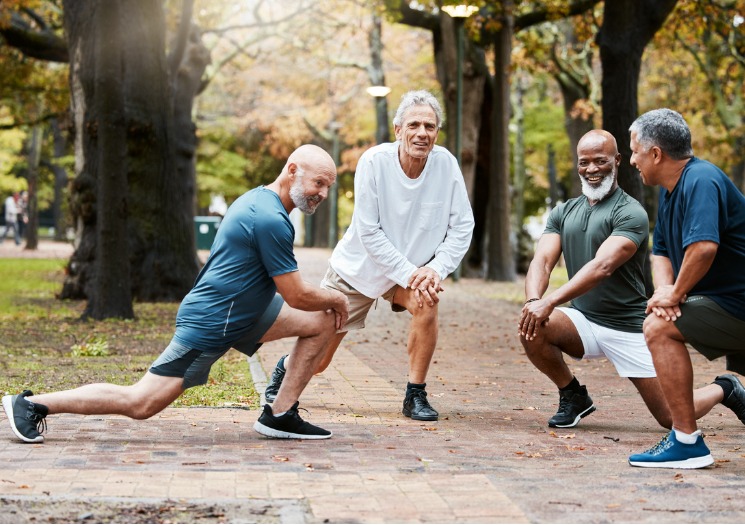 Group of men stretching