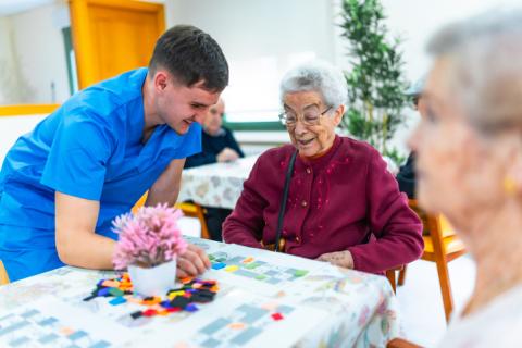 Residents doing crafts at nursing home