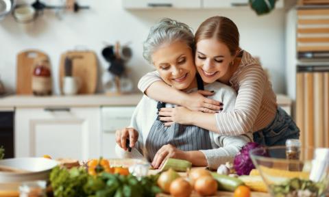 Mother and daughter cooking foods with environmental exposures
